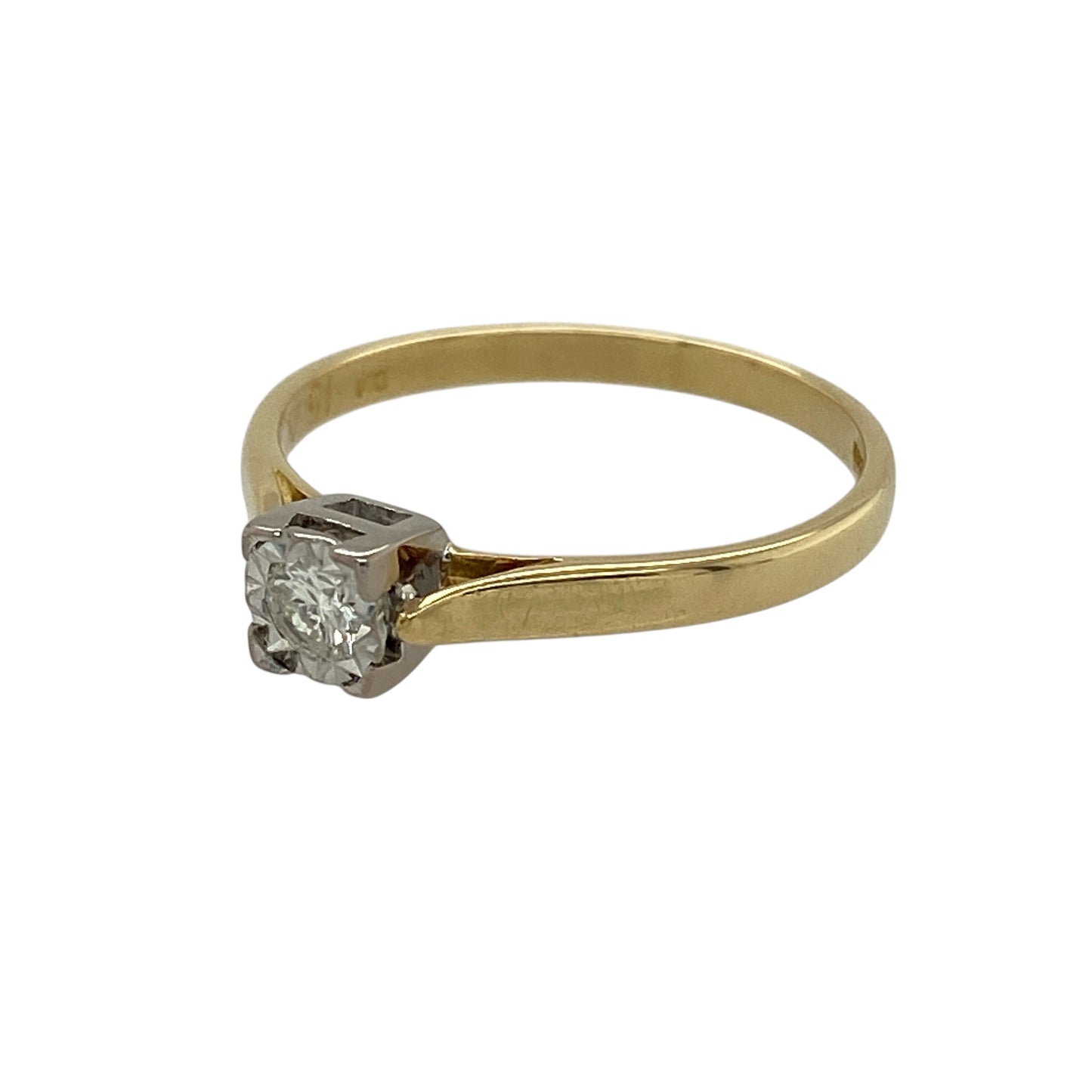 Bring classic charm and understated elegance to your jewellery collection with this pre-owned 18ct yellow gold diamond set vintage solitaire ring, a timeless design with enduring appeal.

Design: This ring features a single brilliant-cut diamond presented in a square setting, giving a subtle vintage character while maintaining a clean and elegant silhouette.
Material: Made from rich 18-carat yellow gold, the warm polished finish beautifully enhances the diamond’s sparkle and the ring’s classic style.
