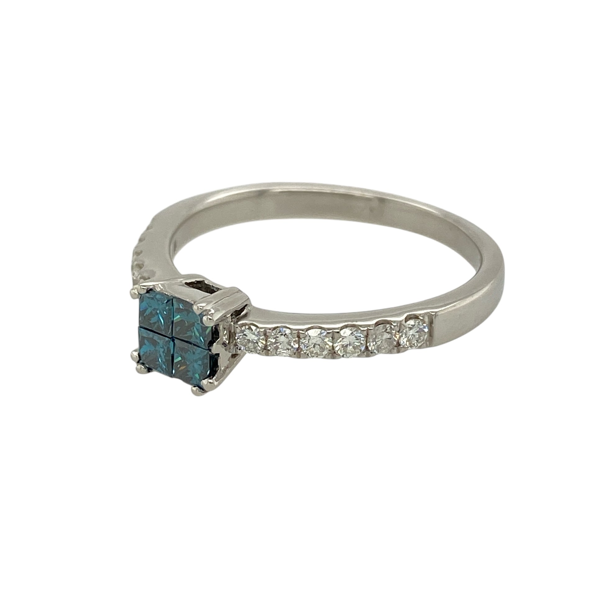 Bring striking colour and contemporary elegance to your jewellery collection with this pre-owned 14ct white gold blue enhanced diamond set solitaire ring, a distinctive design with refined sparkle.

Design: This ring features a central solitaire-style head made up of four princess-cut blue enhanced diamonds arranged together to create a bold focal point, complemented by white brilliant-cut diamonds set along the shoulders for added brilliance.