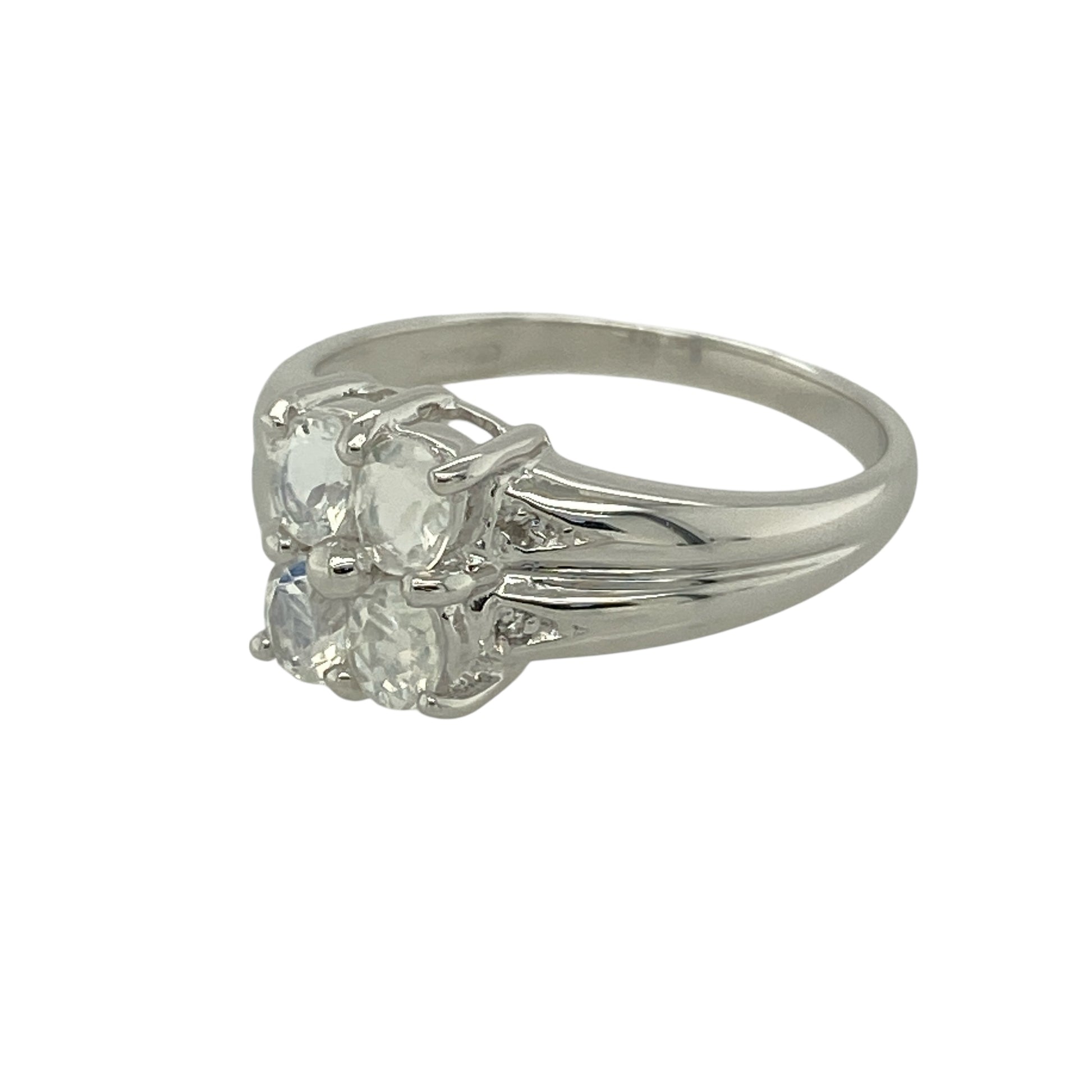 Bring soft iridescence and elegant detail to your jewellery collection with this pre-owned 9ct white gold Sri Lankan rainbow moonstone set ring, a graceful design with timeless appeal.

Design: This ring features four oval Sri Lankan rainbow moonstones arranged across the front, displaying beautiful flashes of colour and a refined, balanced look.
Material: Made from 9-carat white gold, the bright polished finish complements the moonstones’ natural shimmer and enhances the ring’s delicate elegance.