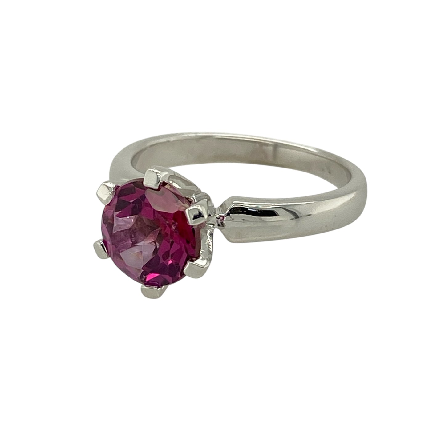 Bring bold colour and refined elegance to your jewellery collection with this pre-owned 9ct white gold cherry topaz set solitaire ring, a striking piece with contemporary charm.

Design: This ring features a single vibrant round cherry topaz as the centrepiece, creating a clean and elegant solitaire look with strong visual impact.
Material: Made from 9-carat white gold, the bright polished finish beautifully complements the rich pink-red tones of the cherry topaz.