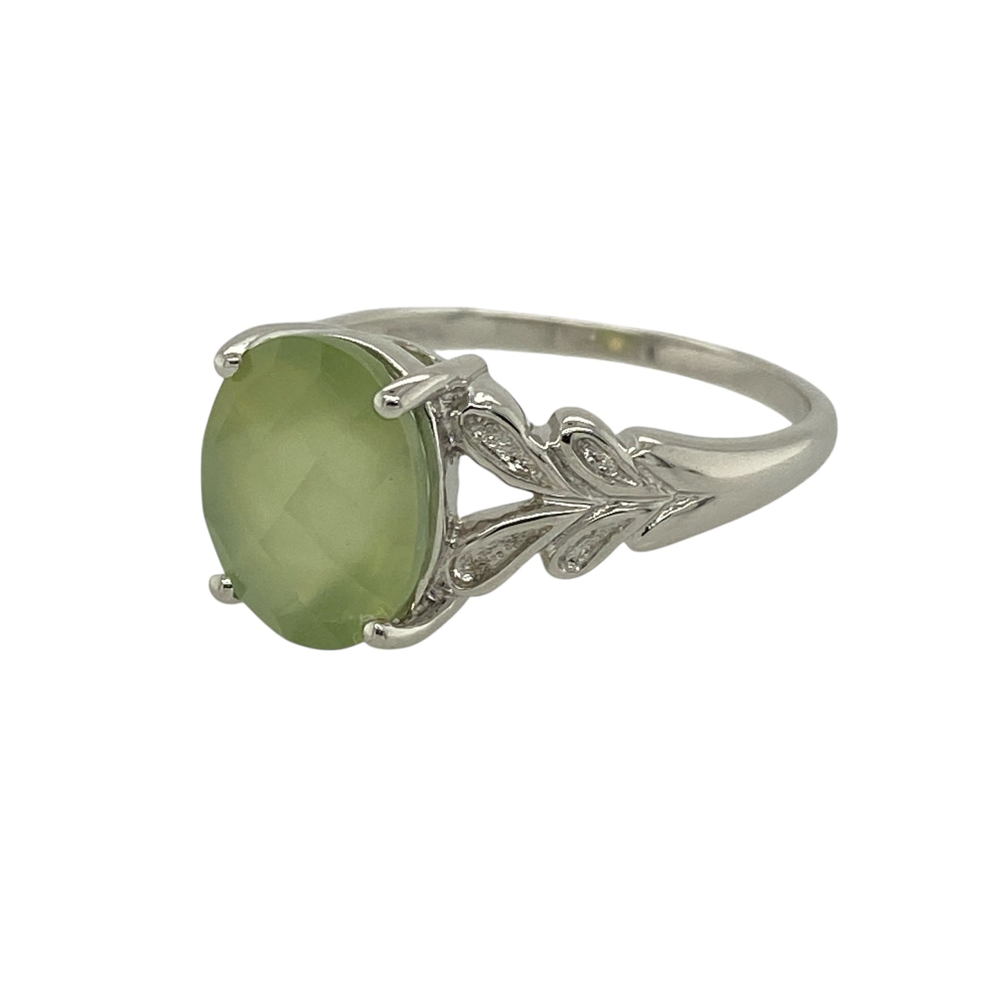 Bring soft, natural beauty and refined elegance to your jewellery collection with this pre-owned 9ct white gold oval prehnite set ring, a graceful piece with understated charm.

Design: This ring features a smooth oval prehnite at the centre, offering a clean and elegant silhouette that highlights the stone’s gentle, translucent green tones.
Material: Made from 9-carat white gold, the bright polished finish complements the soft colouring of the prehnite and enhances the ring’s modern appeal.