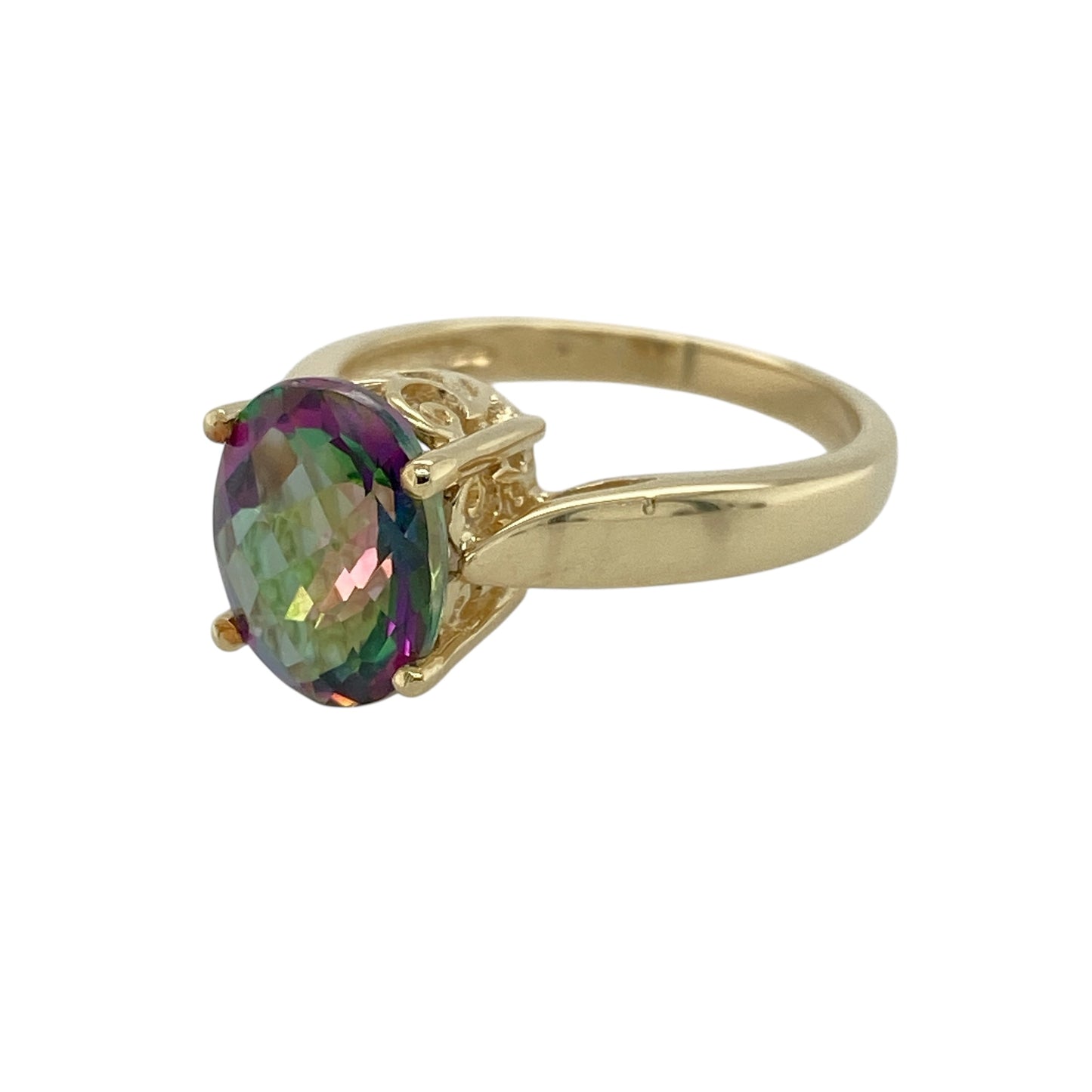 Bring captivating colour and elegant simplicity to your jewellery collection with this pre-owned 9ct yellow gold mystic topaz set solitaire ring, a striking piece with contemporary charm.

Design: This ring features a single oval mystic topaz at the centre, showcasing its vibrant, colour-shifting hues in a clean and elegant solitaire style.
Material: Made from 9-carat yellow gold, the warm polished finish beautifully complements the iridescent tones of the mystic topaz.