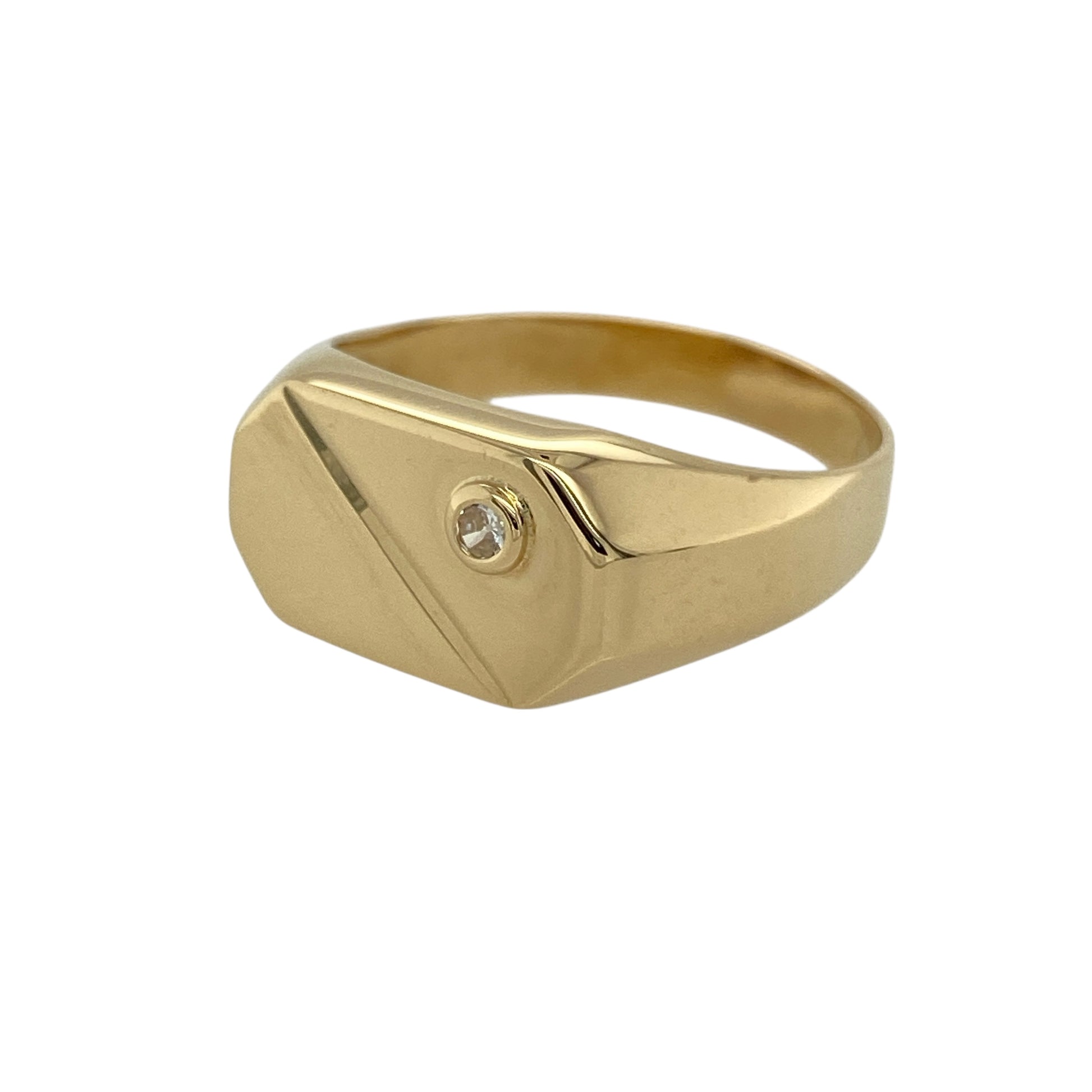 Bring bold style and modern elegance to your jewellery collection with this pre-owned 18ct yellow gold cubic zirconia set geometric signet ring, a striking design with contemporary appeal.

Design: This ring features a geometric-style signet head accented with cubic zirconia stones, creating a clean, architectural look with refined sparkle.
Material: Made from rich 18-carat yellow gold, the warm polished finish enhances the modern lines of the design and adds a luxurious feel.