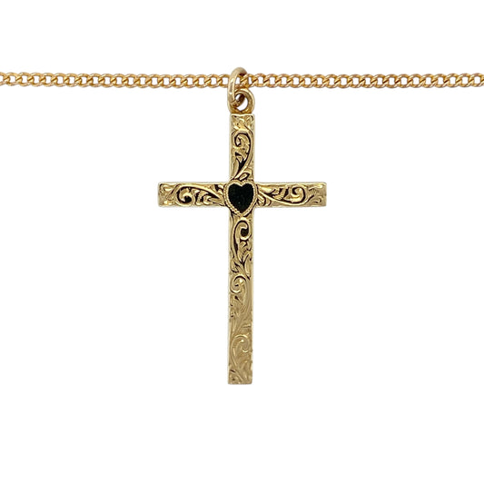 Bring timeless faith and classic style to your jewellery collection with this pre-owned 9ct yellow gold patterned cross pendant necklace, a striking piece with meaningful presence.

Design: The necklace features a traditionally styled cross pendant with decorative patterned detailing, suspended from a classic curb chain for a balanced and enduring look.
Material: Made from 9-carat yellow gold, the warm polished finish enhances the intricate pattern and the pendant’s timeless appeal.