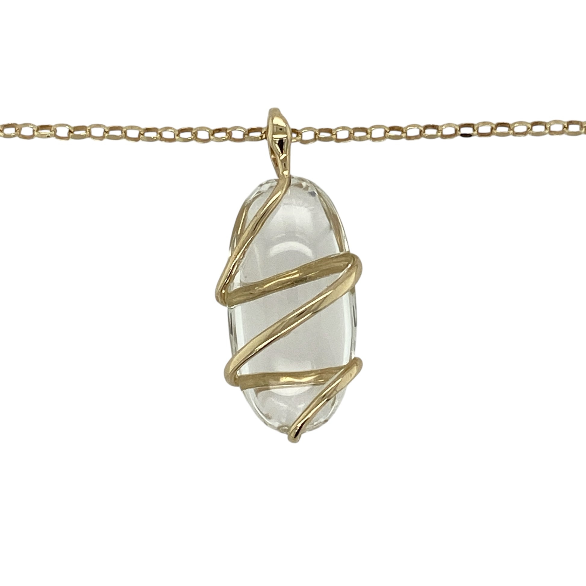 Bring distinctive character and elegant symbolism to your jewellery collection with this pre-owned 9ct gold clear quartz style stone oval pendant necklace, a striking piece with unique detail.

Design: The necklace features an oval clear quartz style stone, enhanced by a decorative bail designed like a snake wrapped around the stone, adding a bold and eye-catching touch. The pendant is suspended from a classic belcher chain for a balanced finish.