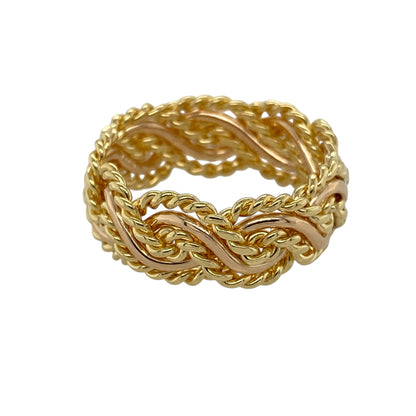 Bring bold elegance and signature Welsh design to your jewellery collection with this pre-owned 18ct yellow and rose gold Clogau twisted band ring, a striking piece with strong visual presence.

Design: This ring features a bold twisted band design, combining flowing lines with a distinctive, sculptural look that reflects classic Clogau style.
