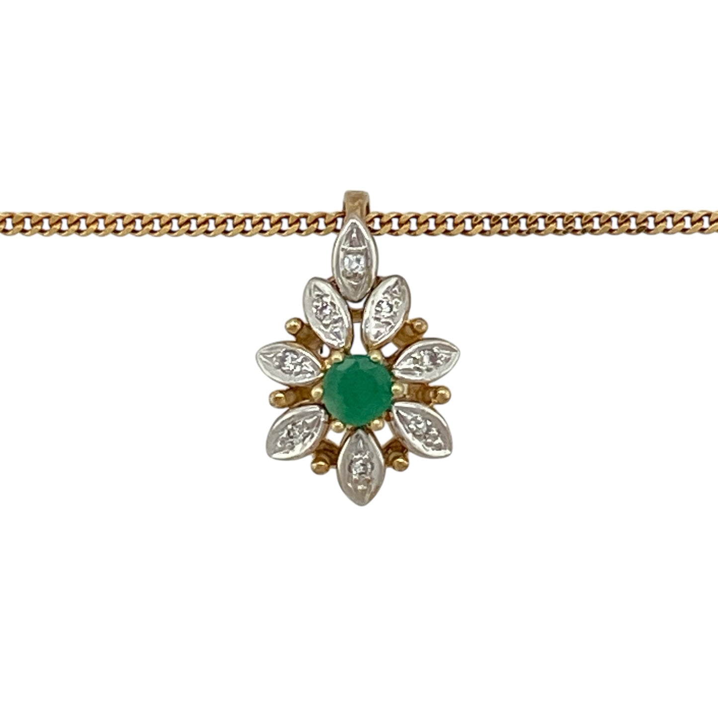 Bring fresh colour and timeless elegance to your jewellery collection with this pre-owned 9ct yellow gold diamond and emerald set flower pendant necklace, a delicate piece with classic charm.

Design: The pendant features a floral-inspired design, centred with a vivid green emerald and accented by diamond detailing, creating a beautifully balanced and feminine look.
Material: Made from 9-carat yellow gold