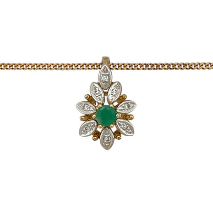 Bring fresh colour and timeless elegance to your jewellery collection with this pre-owned 9ct yellow gold diamond and emerald set flower pendant necklace, a delicate piece with classic charm.

Design: The pendant features a floral-inspired design, centred with a vivid green emerald and accented by diamond detailing, creating a beautifully balanced and feminine look.
Material: Made from 9-carat yellow gold