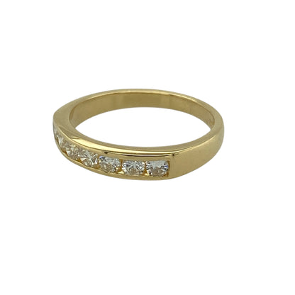Bring timeless elegance and subtle sparkle to your jewellery collection with this pre-owned 18ct yellow gold diamond set band ring.

Design: The ring features a refined band style with diamond accents across the front, measuring approximately 3mm in width for a delicate and classic look.
Material: Made from 18-carat yellow gold, the rich polished finish beautifully complements the sparkle of the diamonds.