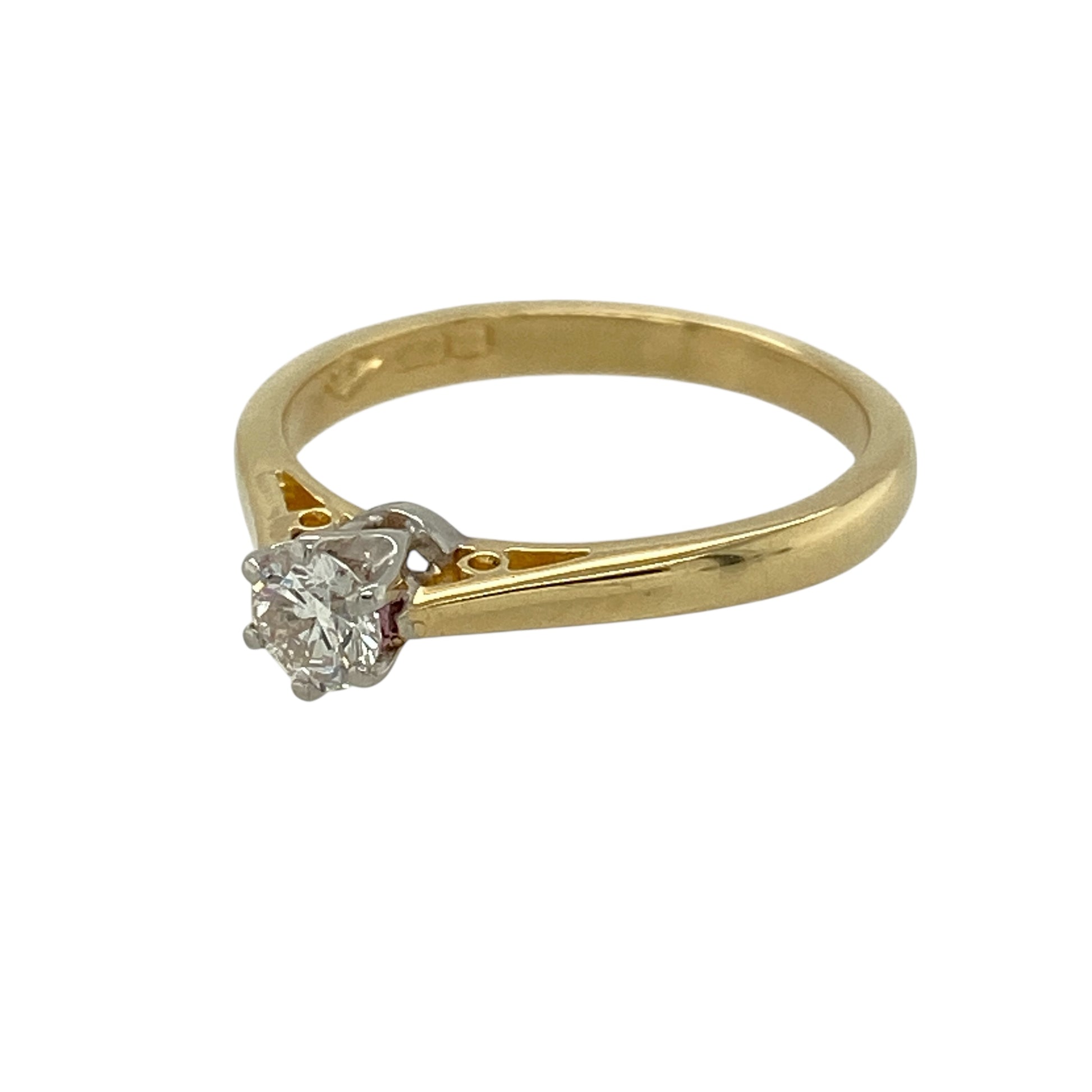 Bring timeless elegance and classic brilliance to your jewellery collection with this pre-owned 18ct yellow gold diamond set solitaire ring.

Design: The ring features a single brilliant-cut diamond at the centre, approximately 0.21ct, creating a clean and iconic solitaire style.
Material: Made from 18-carat yellow gold, the rich polished finish beautifully enhances the sparkle of the diamond.