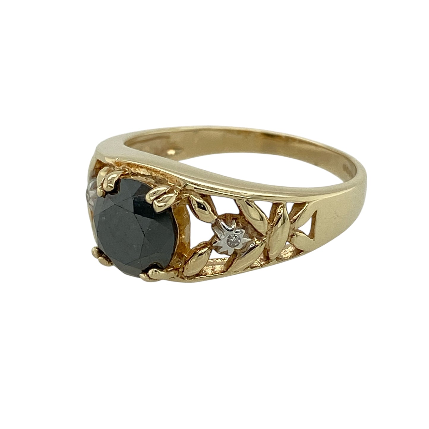 Bring bold contrast and modern elegance to your jewellery collection with this pre-owned 9ct yellow gold black diamond set ring.

Design: The ring features a round black diamond at the centre, measuring approximately 7mm in diameter, flanked by a small white diamond on either side for striking contrast.
Material: Made from 9-carat yellow gold, the warm polished finish beautifully enhances the dramatic look of the black and white diamonds.