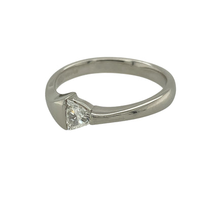 Bring modern elegance and refined brilliance to your jewellery collection with this pre-owned platinum and diamond set trillion cut ring.

Design: The ring features a striking trillion-cut diamond set at the front of the band, with the diamond weighing approximately 0.23ct and creating a clean, contemporary focal point.
Material: Made from platinum, the naturally bright and durable finish enhances the sparkle of the diamond while offering exceptional strength and longevity.