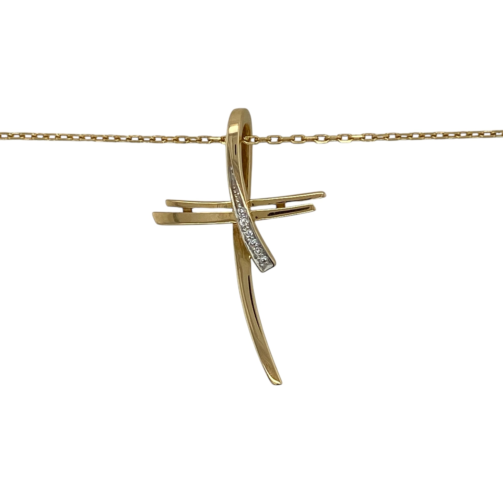 Bring timeless faith and refined sparkle to your jewellery collection with this pre-owned 18ct yellow gold diamond set cross pendant necklace.

Design: The pendant features a classic cross design accented with sparkling diamonds, measuring approximately 3.2cm in length to create a striking yet elegant focal point.
Material: Made from 18-carat yellow gold, the rich polished finish beautifully enhances the brilliance of the diamonds and the traditional cross form.