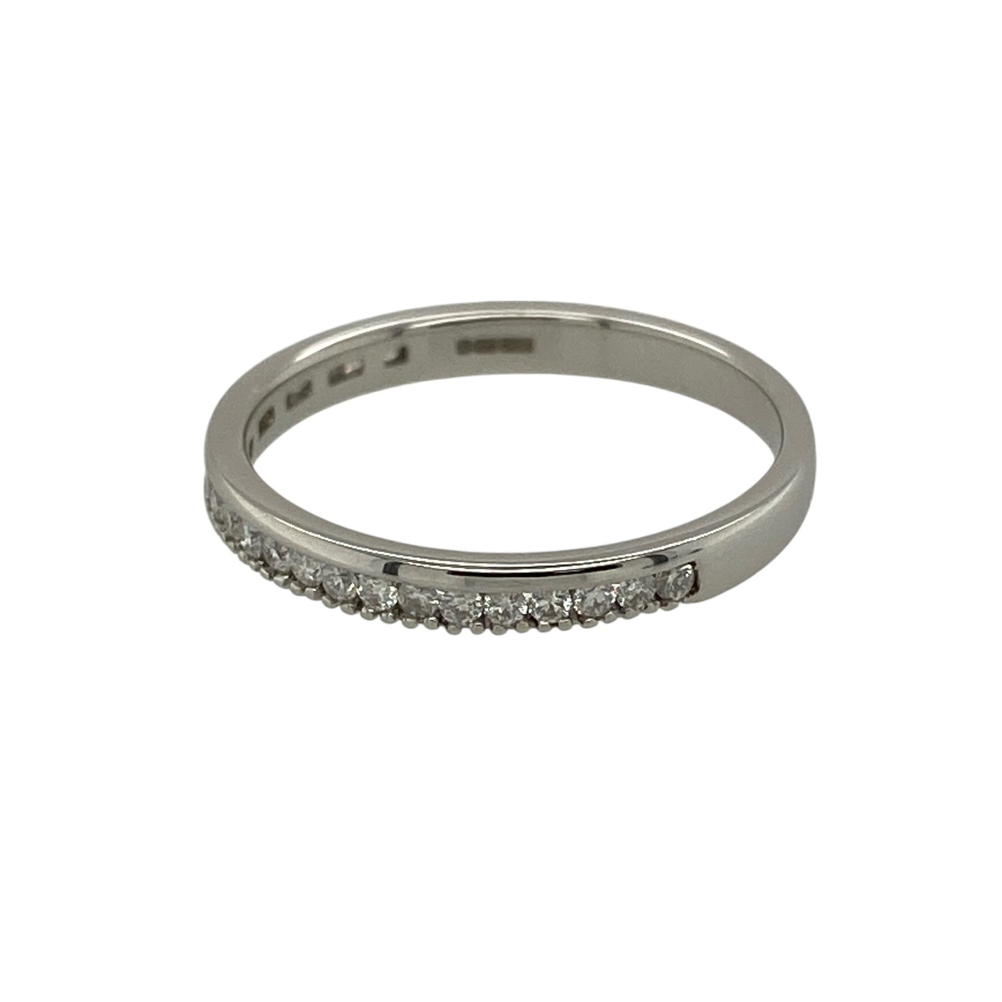 Bring understated sparkle and timeless elegance to your jewellery collection with this pre-owned 18ct white gold diamond set band ring.

Design: The ring features a slim band-style front measuring approximately 2mm in width, accented with sparkling diamonds for a refined and delicate look.
Material: Made from 18-carat white gold, the bright polished finish enhances the brilliance of the diamonds and offers a clean, sophisticated appearance.