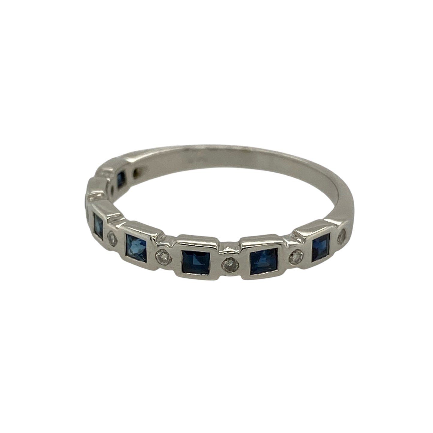 Bring classic colour and refined sparkle to your jewellery collection with this pre-owned 14ct white gold diamond and sapphire set band ring.

Design: The ring features a slim band-style front measuring approximately 3mm in width, set with rich blue sapphires and sparkling diamond accents for a timeless and elegant look.
Material: Made from 14-carat white gold, the bright polished finish beautifully enhances the deep blue tones of the sapphires and the brilliance of the diamonds.