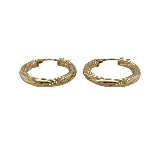 Bring classic elegance with a subtle twist to your jewellery collection with these pre-owned 9ct yellow gold twisted hoop creole earrings.

Design: The earrings feature a timeless hoop creole shape with a twisted finish, adding gentle texture and visual interest to a classic style.
Material: Made from 9-carat yellow gold, the warm polished finish enhances the flowing twist detail beautifully.