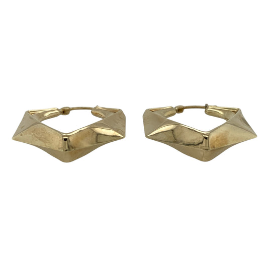 Bring modern geometry and classic gold style to your jewellery collection with these pre-owned 9ct yellow gold hexagon geometric twist hoop creole earrings.

Design: The earrings feature a distinctive hexagon-inspired hoop shape with a subtle twist detail, creating a bold and contemporary geometric silhouette.
Material: Made from 9-carat yellow gold, the warm polished finish enhances the clean lines and sculptural form.