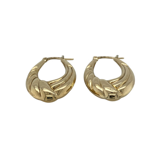 Bring elegant texture and timeless style to your jewellery collection with these pre-owned 9ct yellow gold twist pattern oval creole earrings.

Design: The earrings feature a refined oval creole shape with a twist pattern finish, adding gentle movement and visual interest to a classic silhouette.
Material: Made from 9-carat yellow gold, the warm polished finish beautifully highlights the twisted detailing.