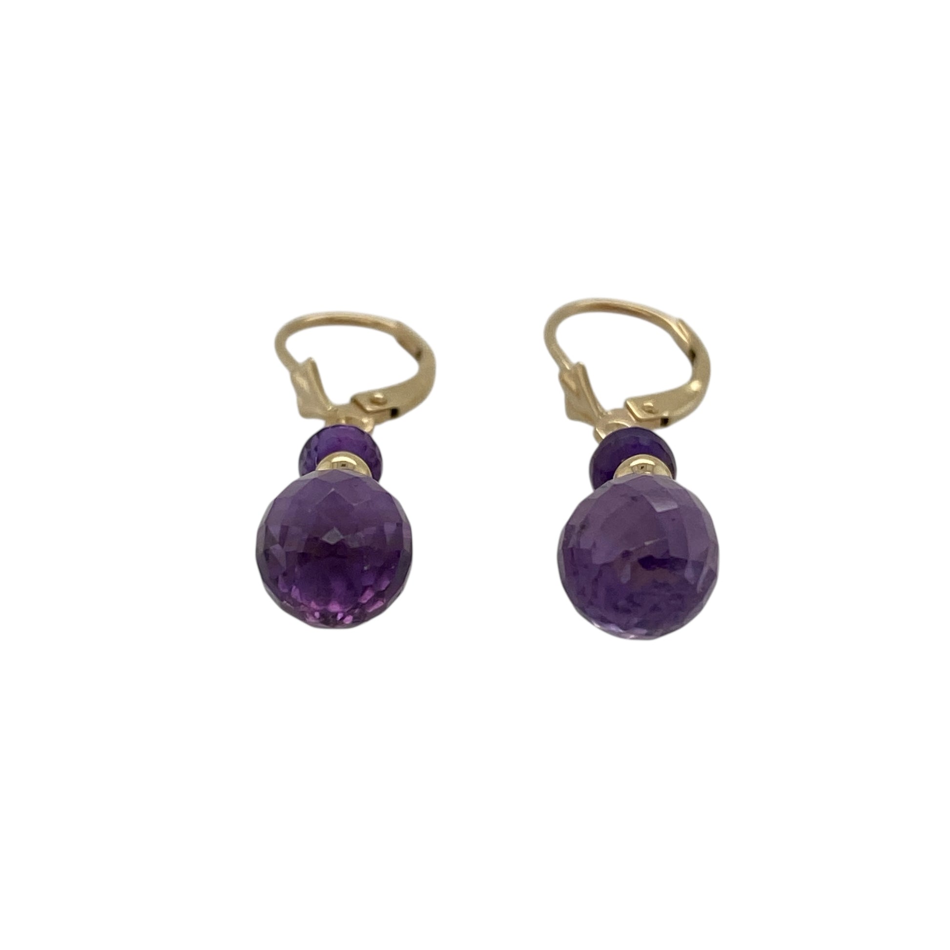Bring rich colour and elegant movement to your jewellery collection with these pre-owned 9ct yellow gold and amethyst set drop earrings.

Design: The earrings feature vibrant amethyst gemstones suspended in a graceful drop design, creating a refined and eye-catching look.
Material: Made from 9-carat yellow gold, the warm polished finish beautifully complements the deep purple tones of the amethyst.