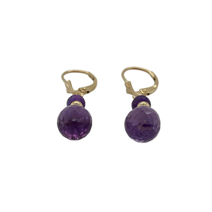 Bring rich colour and elegant movement to your jewellery collection with these pre-owned 9ct yellow gold and amethyst set drop earrings.

Design: The earrings feature vibrant amethyst gemstones suspended in a graceful drop design, creating a refined and eye-catching look.
Material: Made from 9-carat yellow gold, the warm polished finish beautifully complements the deep purple tones of the amethyst.