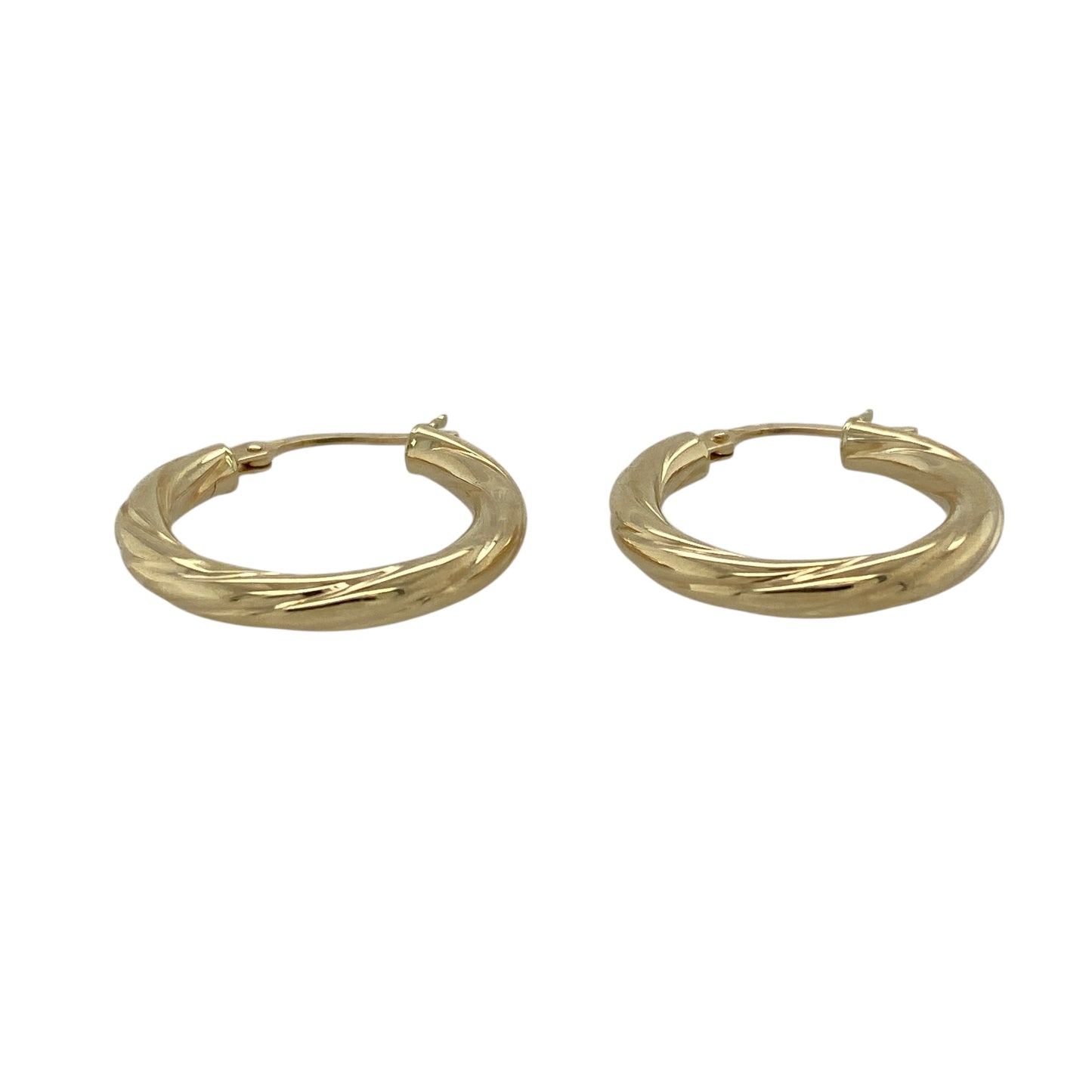 Bring classic elegance with a subtle twist to your jewellery collection with these pre-owned 9ct yellow gold twisted hoop creole earrings.

Design: The earrings feature a timeless hoop creole shape with a twisted finish, adding gentle texture and visual interest to a classic silhouette.
Material: Made from 9-carat yellow gold, the warm polished finish beautifully enhances the flowing twist detail.