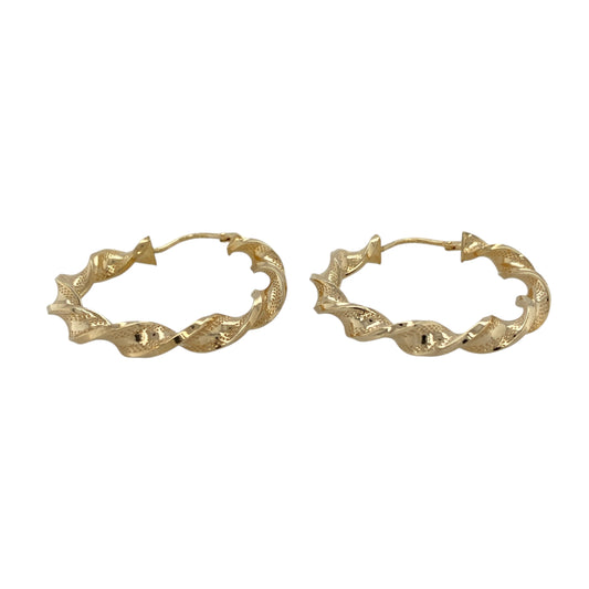 Bring elegant movement and textured detail to your jewellery collection with these pre-owned 9ct yellow gold ribbon twisted patterned hoop creole earrings, offering a refined yet eye-catching design—perfect for everyday wear or special occasions.

Design: The earrings feature a hoop creole style with a ribbon-inspired twisted and patterned finish, creating a flowing and dimensional look with added visual interest.