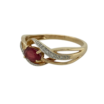 Bring rich colour and graceful movement to your jewellery collection with this pre-owned 9ct yellow gold diamond and ruby set twist ring, combining classic gemstones with an elegant flowing design—perfect for everyday wear or special occasions.

Design: The ring features an oval ruby at the centre measuring approximately 6mm by 4mm, complemented by diamond accents within a stylish twist design that adds softness and visual interest.
