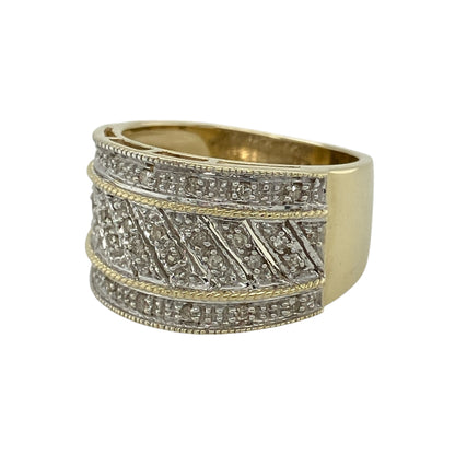 Bring bold elegance and timeless sparkle to your jewellery collection with this pre-owned 9ct yellow gold diamond set wide band ring, offering a striking design with classic appeal—perfect for statement wear or special occasions.

Design: The ring features a wide band profile with diamond accents, creating a confident and eye-catching look. The front of the ring measures approximately 12mm in height, giving it a strong and elegant presence on the hand.