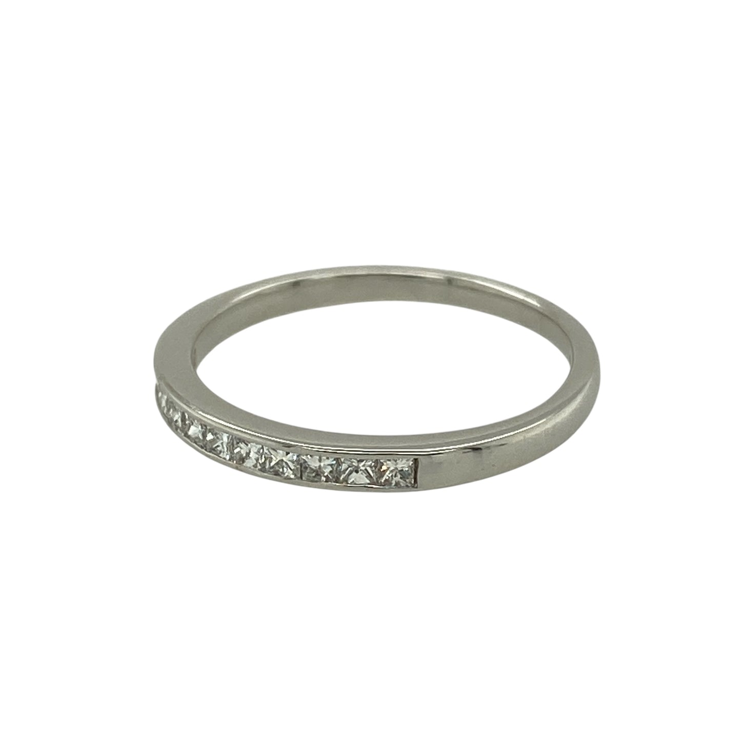 Bring understated elegance and refined sparkle to your jewellery collection with this pre-owned 18ct white gold diamond set band ring, offering a sleek and timeless design—perfect for everyday wear or subtle occasion styling.

Design: The ring features a slim band style accented with diamonds across the front, measuring approximately 2mm in width for a delicate and elegant profile.