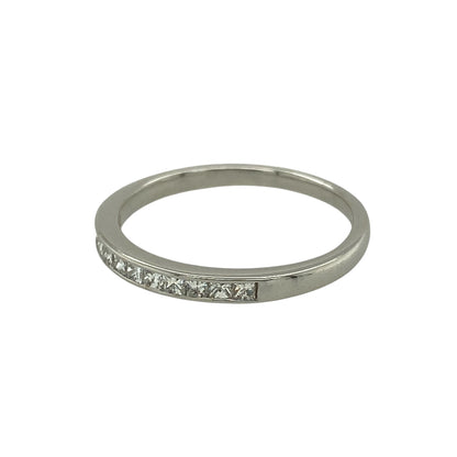 Bring understated elegance and refined sparkle to your jewellery collection with this pre-owned 18ct white gold diamond set band ring, offering a sleek and timeless design—perfect for everyday wear or subtle occasion styling.

Design: The ring features a slim band style accented with diamonds across the front, measuring approximately 2mm in width for a delicate and elegant profile.