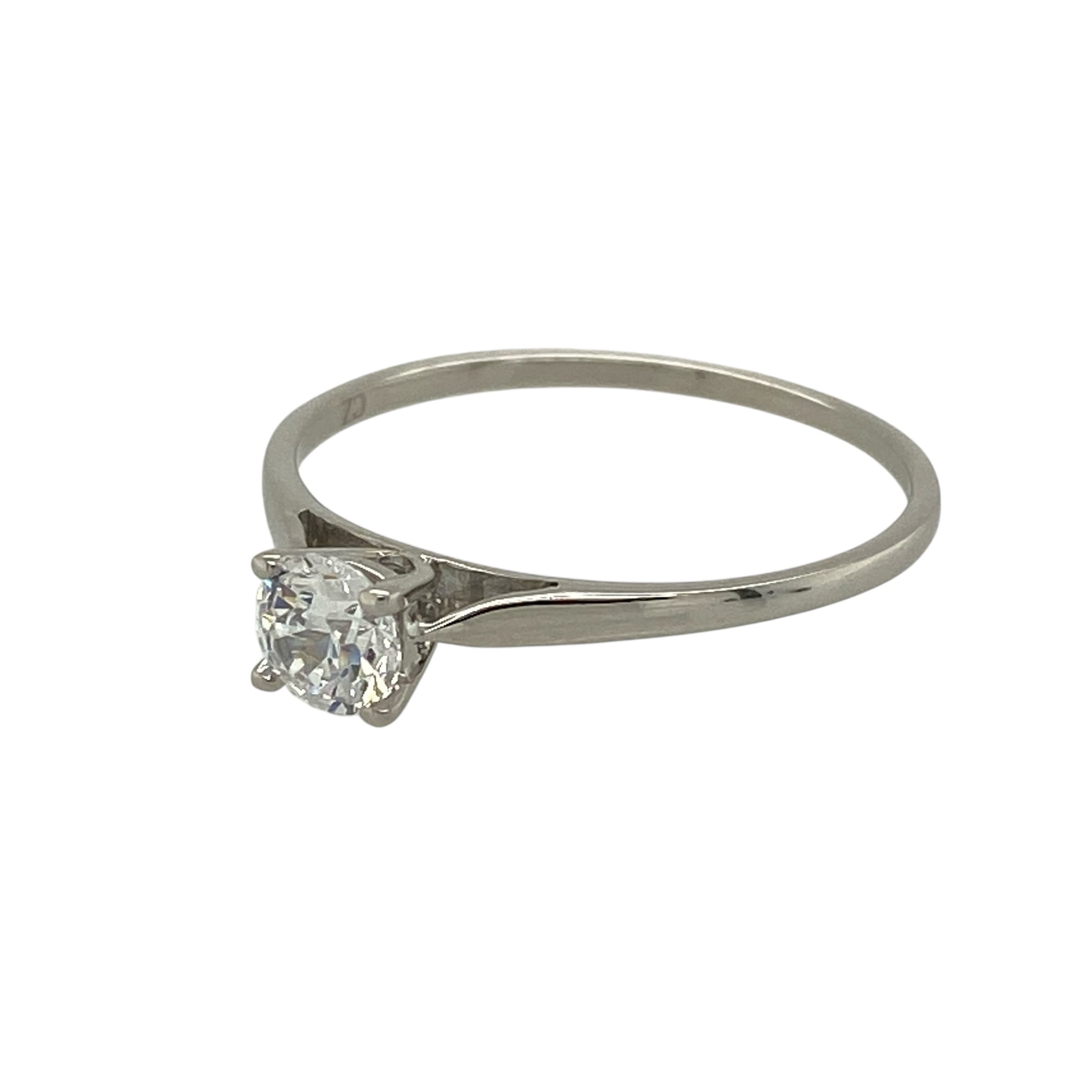 Bring clean elegance and subtle sparkle to your jewellery collection with this pre-owned 9ct white gold cubic zirconia set solitaire ring, offering a timeless and refined design—perfect for everyday wear or minimalist styling.

Design: The ring features a single round cubic zirconia at the centre measuring approximately 5mm in diameter, creating a classic solitaire look with bright, eye-catching sparkle.