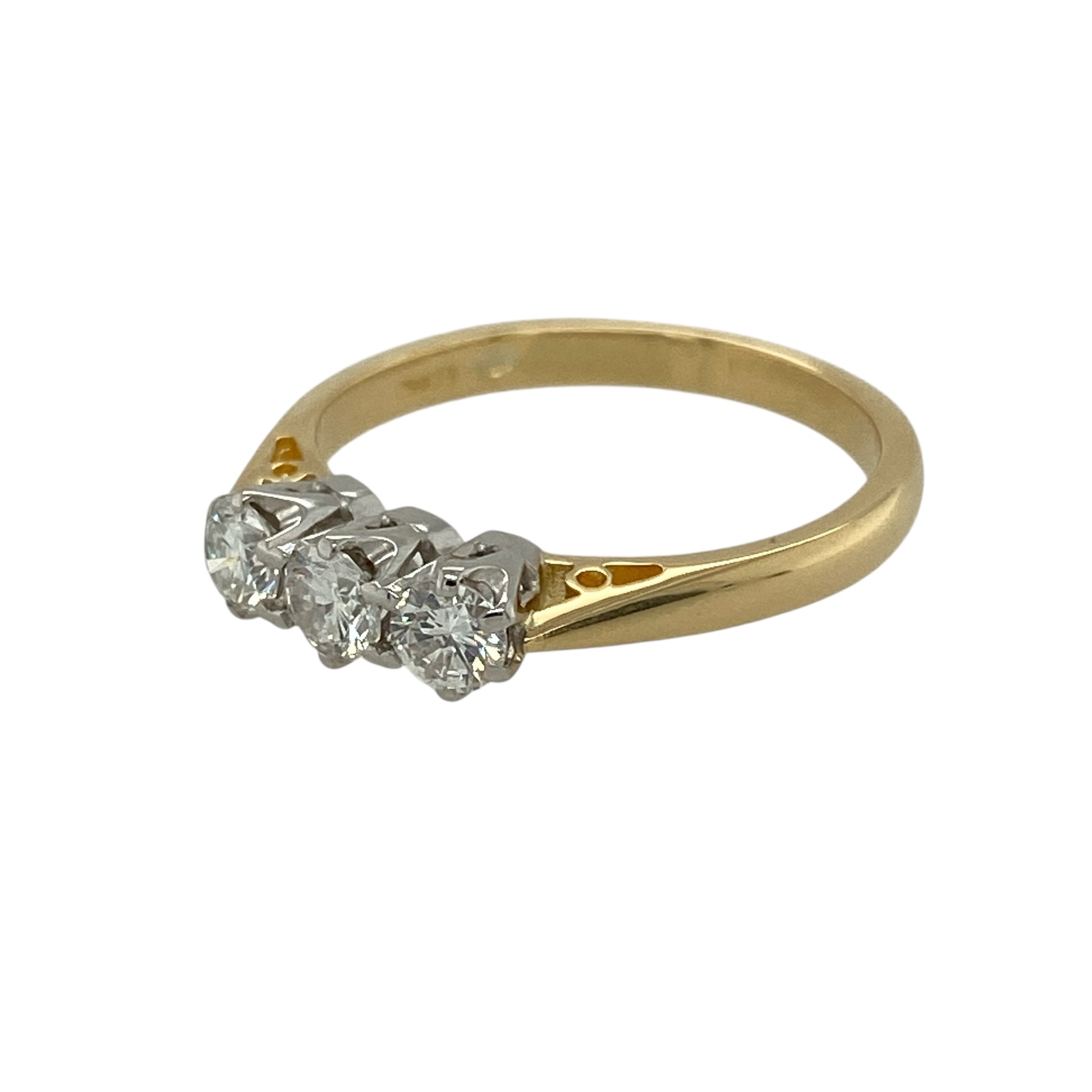 Bring timeless elegance and meaningful symbolism to your jewellery collection with this pre-owned 18ct yellow gold diamond set trilogy ring, showcasing classic brilliance in a refined design—perfect for special occasions or lasting everyday wear.

Design: The ring features three brilliant-cut diamonds arranged in a traditional trilogy style, symbolising past, present, and future, and creating a beautifully balanced and elegant look.