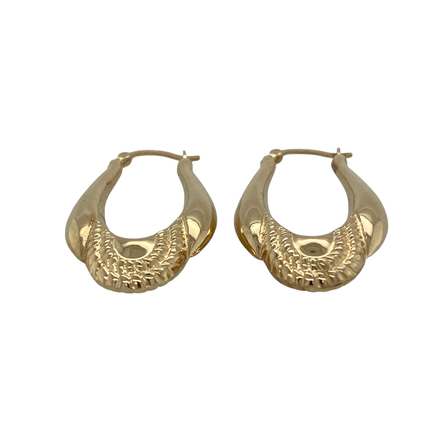 Bring classic style and refined detail to your jewellery collection with these pre-owned 9ct yellow gold patterned oval creole earrings, offering a timeless design with a more substantial feel—perfect for everyday wear or special occasions.

Design: The earrings feature an oval creole shape with a patterned finish, adding texture and visual interest while maintaining a clean and elegant look.
Material: Made from 9-carat yellow gold, the polished patterned surface enhances the warm golden tone beautifully.
