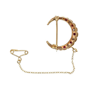 Preowned 9ct Yellow and White Gold Diamond & Ruby Set Antique Crescent Moon Brooch with the weight 5.30 grams. The center biggest ruby stone is 3mm diameter
