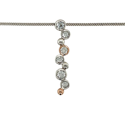 Preowned 925 Silver with 9ct Rose Gold Clogau & White Topaz Set Clogau Bubble Pendant on an adjustable 18", 20" - 22" Clogau curb chain with the weight 5.10 grams. The pendant is 3.3cm long