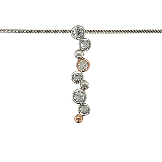 Preowned 925 Silver with 9ct Rose Gold Clogau & White Topaz Set Clogau Bubble Pendant on an adjustable 18", 20" - 22" Clogau curb chain with the weight 5.10 grams. The pendant is 3.3cm long