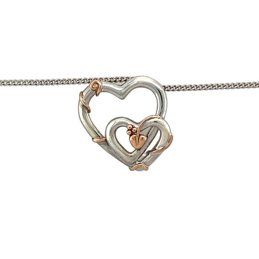 Preowned 925 Silver with 9ct Rose Gold Clogau Tree of Life Double Heart Pendant on an adjustable 18", 20" - 22" Clogau curb chain with the weight 6 grams. The pendant is 2.2cm long