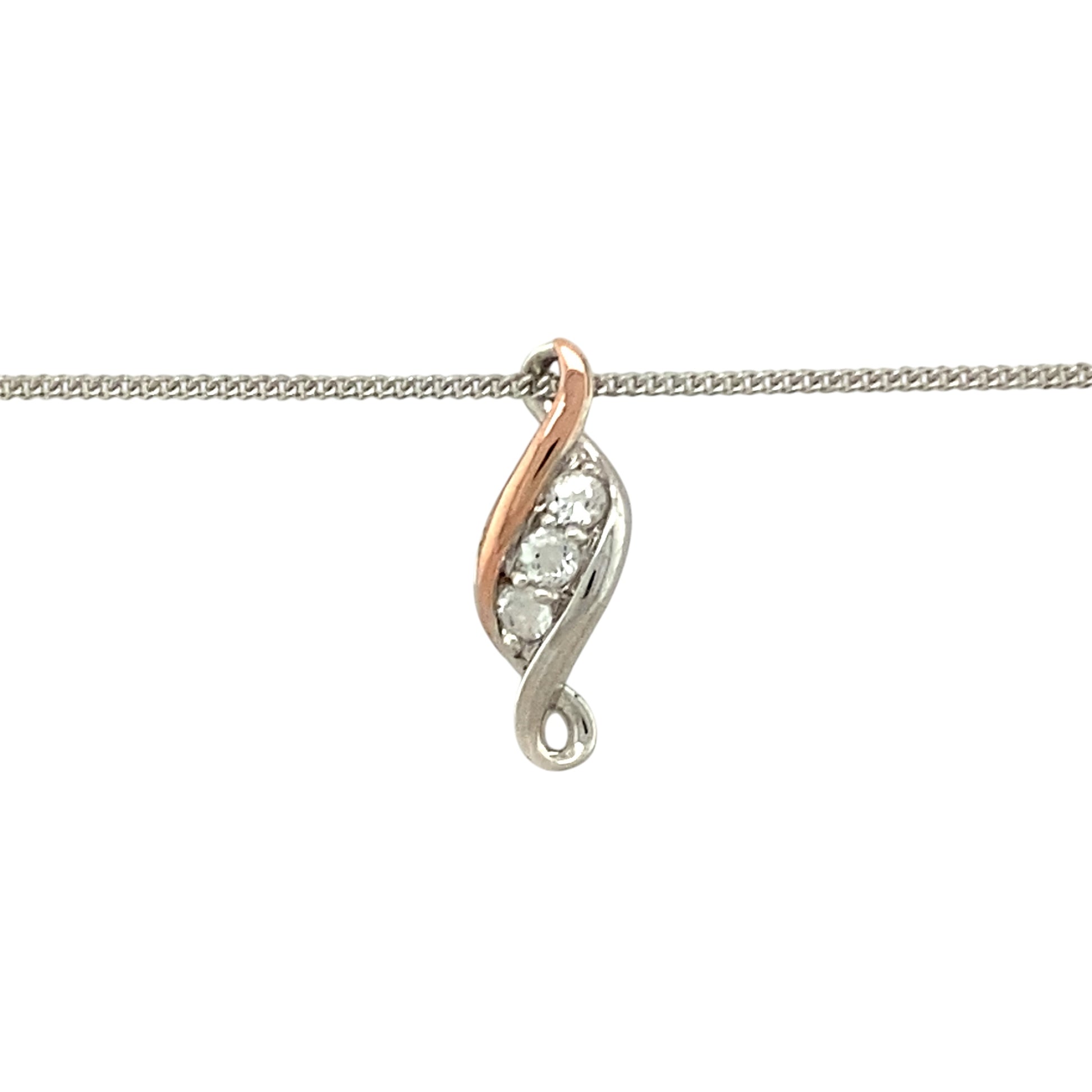 Celebrate life’s journey with this pre-owned 925 silver and 9ct rose gold Clogau Past, Present and Future pendant—a symbolic design enhanced with white topaz sparkle and timeless elegance.

Design: The pendant measures 1.8cm long and features three white topaz stones in a vertical arrangement, representing the past, present, and future. Delicate 9ct rose gold detailing adds warmth and meaning to the design.
