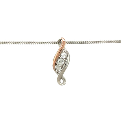 Celebrate life’s journey with this pre-owned 925 silver and 9ct rose gold Clogau Past, Present and Future pendant—a symbolic design enhanced with white topaz sparkle and timeless elegance.

Design: The pendant measures 1.8cm long and features three white topaz stones in a vertical arrangement, representing the past, present, and future. Delicate 9ct rose gold detailing adds warmth and meaning to the design.
