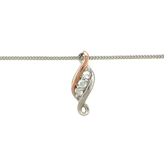 Celebrate life’s journey with this pre-owned 925 silver and 9ct rose gold Clogau Past, Present and Future pendant—a symbolic design enhanced with white topaz sparkle and timeless elegance.

Design: The pendant measures 1.8cm long and features three white topaz stones in a vertical arrangement, representing the past, present, and future. Delicate 9ct rose gold detailing adds warmth and meaning to the design.
