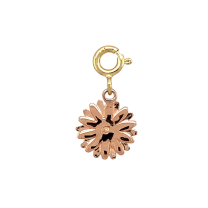 Add a touch of warmth and symbolism to your jewellery with this pre-owned 9ct yellow and rose gold Clogau sunflower charm—delicate, meaningful, and full of charm.

Design: This detailed sunflower charm features intricate petal work with a raised centre, capturing the natural beauty and optimism of the sunflower.
Material: Made from 9-carat yellow and rose gold, the charm includes a touch of rare Welsh gold—bringing signature Clogau character and heritage.
