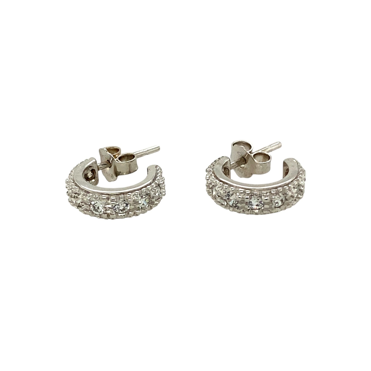 Add a touch of elegance to your jewellery collection with these pre-owned 18ct white gold and cubic zirconia set half hoop stud earrings, featuring:

Design: Classic half hoop stud earrings, set with sparkling cubic zirconia for a timeless and sophisticated look.
Material: Crafted from 18-carat white gold, offering a sleek and luxurious finish.
Weight: A well-balanced 3.40 grams, ensuring durability while remaining comfortable to wear.
A versatile and stylish accessory, perfect for adding subtle sparkle to 