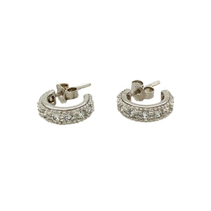 Add a touch of elegance to your jewellery collection with these pre-owned 18ct white gold and cubic zirconia set half hoop stud earrings, featuring:

Design: Classic half hoop stud earrings, set with sparkling cubic zirconia for a timeless and sophisticated look.
Material: Crafted from 18-carat white gold, offering a sleek and luxurious finish.
Weight: A well-balanced 3.40 grams, ensuring durability while remaining comfortable to wear.
A versatile and stylish accessory, perfect for adding subtle sparkle to 