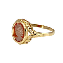 Load image into Gallery viewer, Add a touch of vintage charm to your jewellery collection with this pre-owned 9ct yellow gold &amp; cameo set patterned surround ring, featuring:

Design: A classic ring with a beautifully detailed cameo, framed by an elegant patterned surround.
Material: 9-carat yellow gold, offering a warm and timeless appeal.
Gemstone: Features a 10mm by 8mm cameo, adding a refined and traditional touch.
Size &amp; Weight: Designed in size R, with a lightweight yet durable 1.70 grams for a comfortable fit.

