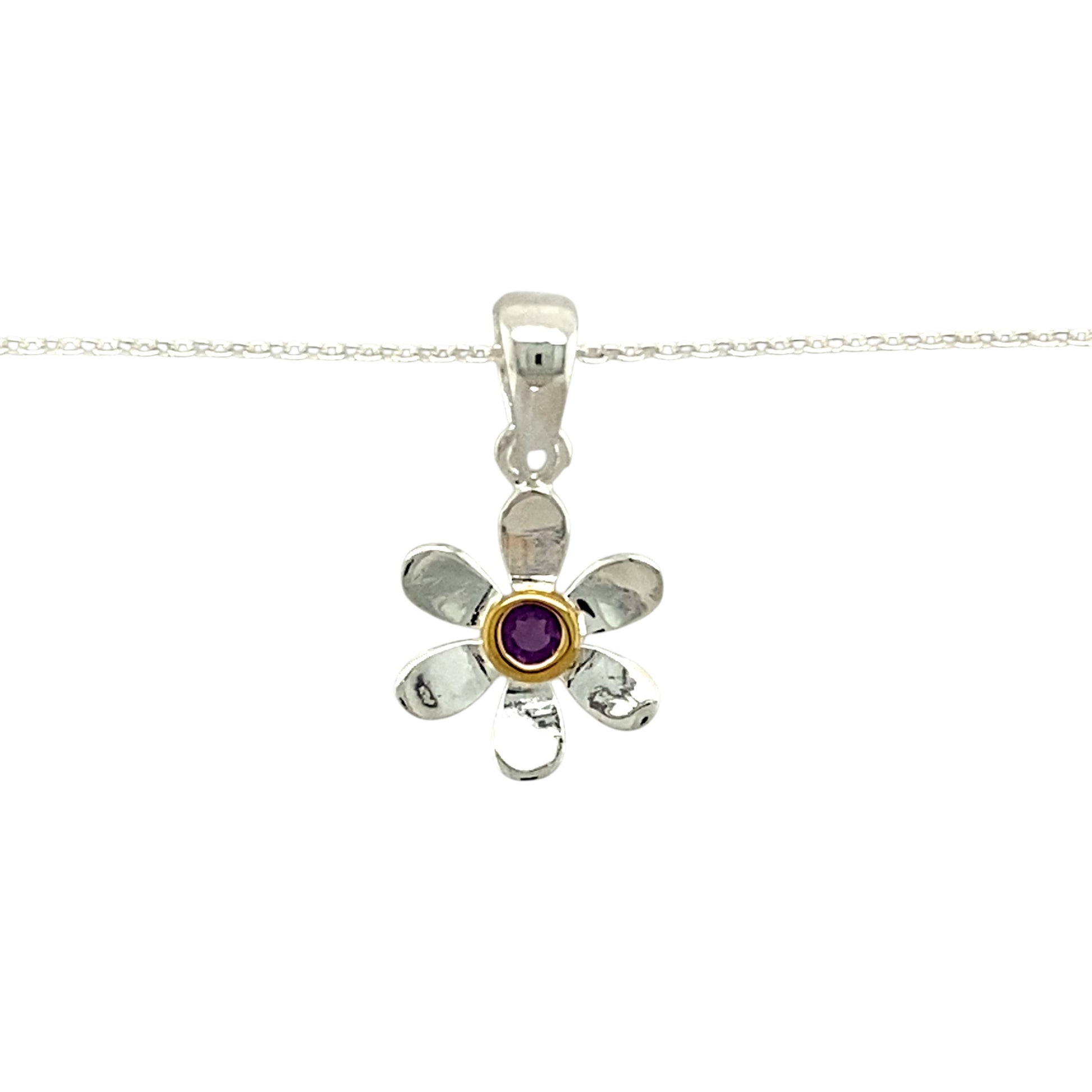 Add a touch of elegance and personal meaning to your jewellery collection with this new 925 silver & amethyst set flower birthstone pendant necklace, featuring:

Design: A delicate flower-shaped pendant, set with a stunning amethyst birthstone at its centre for a timeless and meaningful touch.
Material: 925 sterling silver, with a gold-plated setting around the amethyst for added warmth and contrast.
Gemstone: Features a 2mm diameter amethyst, known as the birthstone for February, symbolising wisdom and tra