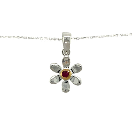 Add a touch of elegance and personal meaning to your jewellery collection with this new 925 silver & ruby set flower July birthstone pendant necklace, featuring:

Design: A delicate flower-shaped pendant, set with a vibrant ruby birthstone at its centre for a timeless and meaningful touch.
Material: 925 sterling silver, with a gold-plated setting around the ruby for added warmth and contrast.
Gemstone: Features a 2mm diameter ruby, known as the birthstone for July, symbolising passion and prosperity.