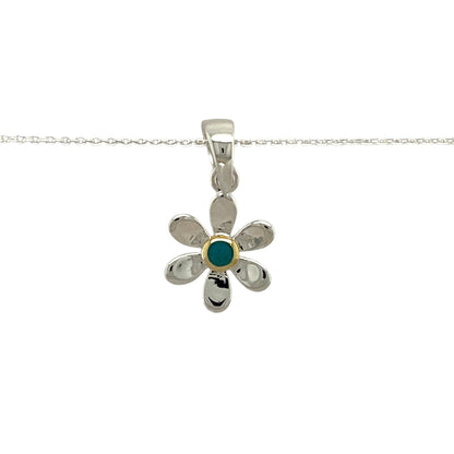 Add a touch of elegance and personal meaning to your jewellery collection with this new 925 silver & turquoise set flower December birthstone pendant necklace, featuring:

Design: A delicate flower-shaped pendant, set with a vibrant turquoise birthstone at its centre for a timeless and meaningful touch.
Material: 925 sterling silver, with a gold-plated setting around the turquoise for added warmth and contrast.
Gemstone: Features a 2mm diameter turquoise, known as the birthstone for December, symbolising pr