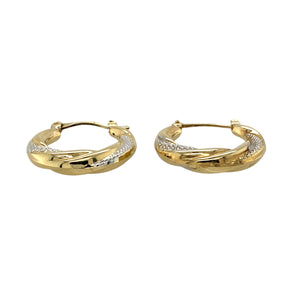 Add a touch of elegance to your jewellery collection with these pre-owned 9ct yellow and white gold patterned hoop creole earrings, featuring:

Design: Stylish hoop creole earrings with an intricate patterned finish for added texture and sophistication.
Material: 9-carat yellow and white gold, creating a beautiful two-tone contrast.
Weight: A lightweight 1.40 grams, ensuring comfort for everyday wear.
A versatile and refined accessory, perfect for adding subtle elegance to any outfit.