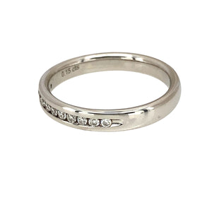 Add a touch of timeless elegance to your jewellery collection with this pre-owned 9ct white gold & diamond set band ring, featuring:

Design: A sleek and sophisticated band ring, adorned with sparkling diamonds for a refined and elegant look.
Material: 9-carat white gold, offering a modern and luxurious finish.
Gemstones: Set with approximately 0.15ct of diamond content in total, adding brilliance and sophistication.
Size & Weight: Designed in size M, with a well-balanced weight of 2.80 grams for a comforta