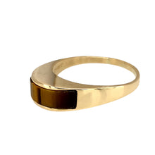 Load image into Gallery viewer, Add a bold and earthy touch to your jewellery collection with this pre-owned 9ct yellow gold &amp; tiger&#39;s eye set ring, featuring:

Design: A striking tiger&#39;s eye ring, showcasing the stone’s natural chatoyancy for a distinctive and timeless look.
Material: 9-carat yellow gold, offering a warm and classic appeal.
Gemstone: Features a 4mm by 15mm tiger’s eye stone, known for its rich golden-brown hues and protective qualities.
Size &amp; Weight: Designed in size T
